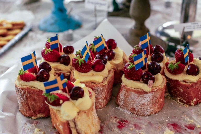 Pastries decorated with little Swedish flags