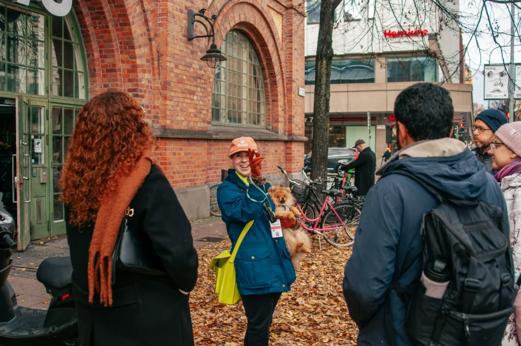 Tour group outside a red-brick building on the Stockholm Innovation Tour