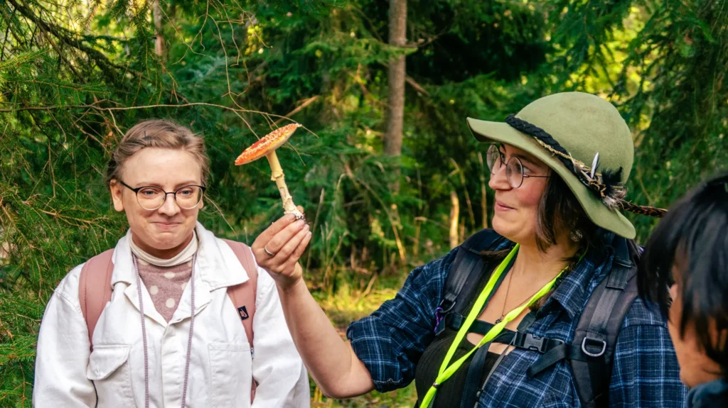 Jana and a guest on a forest hike near Stockholm