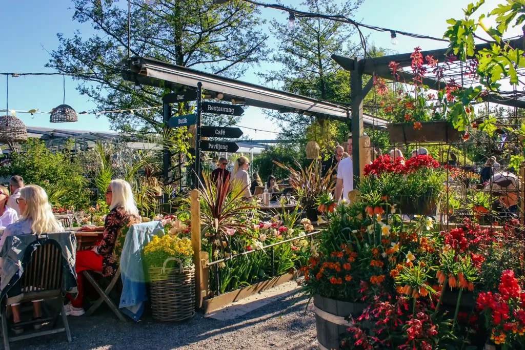 Outdoor restaurant terrace full of flowers in Stockholm