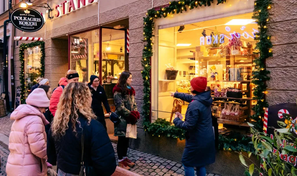 Guests at a Gamla Stan Christmas candy shop