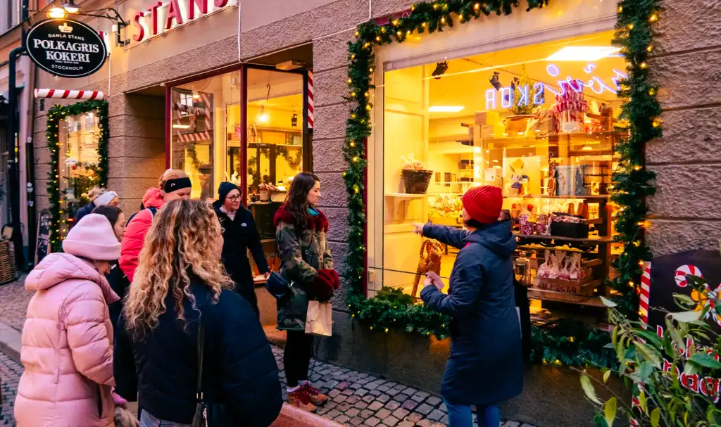 Guests at a Gamla Stan Christmas candy shop