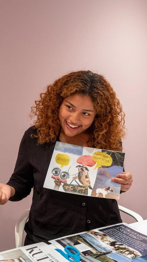 Juliet showing her artwork during the Urban Art Workshop