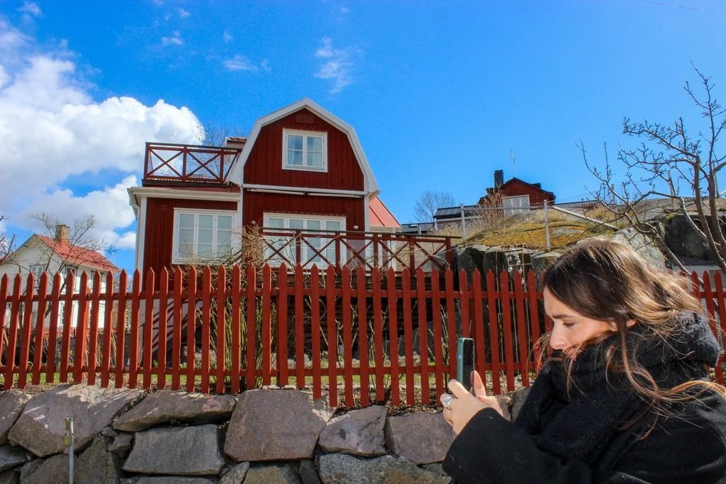 Melina taking photos in Vaxholm for Instagram